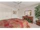 Comfortable primary bedroom featuring a queen-sized bed and ample natural light at 10626 N 8Th St, Phoenix, AZ 85020
