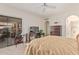 Bright main bedroom featuring patio access, ceiling fan, and plenty of natural light at 10626 N 8Th St, Phoenix, AZ 85020