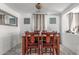 Cozy dining room with a wooden table set and decorative accents at 12128 W Range Mule Dr, Peoria, AZ 85383