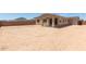 Spacious backyard featuring a covered patio, perfect for outdoor relaxation and entertaining at 12389 W Marguerite Ave, Avondale, AZ 85323
