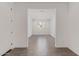 Light-filled room with tiled floor, offering a seamless transition into another room with natural light at 12389 W Marguerite Ave, Avondale, AZ 85323
