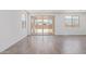 Bright and airy living room with sliding glass doors leading to the backyard at 12389 W Marguerite Ave, Avondale, AZ 85323