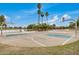 Community features a basketball court, palm trees, and easy access to the lake at 1245 W Lobo Ave, Mesa, AZ 85202