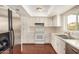 This kitchen showcases white cabinets, modern appliances, ample counter space, and hardwood floors at 1245 W Lobo Ave, Mesa, AZ 85202