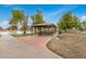 Charming covered picnic area by the lake, with tables and seating for outdoor dining and gatherings at 1245 W Lobo Ave, Mesa, AZ 85202