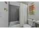 Stylish bathroom featuring a shower with gray subway tile and attractive decorative towels at 1320 N Brittany Ln, Gilbert, AZ 85233