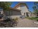 Backyard view of home showing patio, turf, and stucco exterior at 1320 N Brittany Ln, Gilbert, AZ 85233