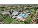 A beautiful community aerial view featuring a clubhouse, pool, and recreational facilities, providing a resort-like atmosphere at 13722 N 150Th Ln, Surprise, AZ 85379