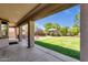 Backyard with a gazebo, green grass, and covered patio at 13722 N 150Th Ln, Surprise, AZ 85379