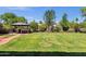 Expansive backyard featuring a well-manicured lawn and charming gazebo at 13722 N 150Th Ln, Surprise, AZ 85379