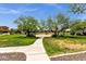 A well-maintained community park offers green spaces and a playground, perfect for Gathering outings and recreation at 13722 N 150Th Ln, Surprise, AZ 85379