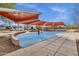 A community splash pad offers children a fun and refreshing way to cool off on warm days, with shaded areas at 13722 N 150Th Ln, Surprise, AZ 85379