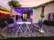 A lovely backyard with patio, chairs and tables at 14211 N 149Th Dr, Surprise, AZ 85379