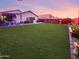 Beautiful backyard with a well-maintained lawn at 14211 N 149Th Dr, Surprise, AZ 85379