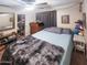 Bedroom with built-in storage and a large mirror at 14211 N 149Th Dr, Surprise, AZ 85379