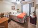 Bedroom with a ceiling fan and natural light at 14211 N 149Th Dr, Surprise, AZ 85379