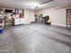Spacious two-car garage with ample storage and laundry area at 14211 N 149Th Dr, Surprise, AZ 85379