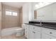Bathroom featuring tiled floors and shower and a vanity with a dark counter at 1515 N Saguaro Dr, Tempe, AZ 85288
