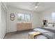 This staged bedroom features carpet flooring and minimalist decor at 1515 N Saguaro Dr, Tempe, AZ 85288