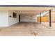 Spacious carport featuring white walls and ceiling, providing ample covered parking at 1515 N Saguaro Dr, Tempe, AZ 85288