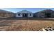 New construction home with a large backyard showing the possibilities for outdoor living and landscaping at 15785 W Beryl Ave, Waddell, AZ 85355