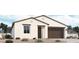 Charming single-story home featuring a two-car garage and neutral color palette at 15785 W Beryl Ave, Waddell, AZ 85355