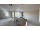 Bright living room featuring neutral walls and sliding doors providing ample natural light and an open layout at 15785 W Beryl Ave, Waddell, AZ 85355