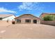 Spacious backyard featuring a gravel landscape, perfect for low-maintenance living and customization under a bright, sunny sky at 1623 E Leaf Rd, San Tan Valley, AZ 85140