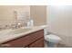 Bathroom featuring a neutral color scheme, a granite-look sink top, with shower and toilet at 1623 E Leaf Rd, San Tan Valley, AZ 85140