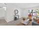 Bright living area features neutral paint, tiled floors, and comfortable seating at 16421 N 65Th Pl, Scottsdale, AZ 85254