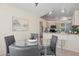 A stylish dining area with an adjoining kitchen perfect for entertaining and casual meals at 17141 E Rockwood Dr, Fountain Hills, AZ 85268