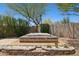 Outdoor hot tub surrounded by decorative tile and landscaping, a backyard oasis at 17141 E Rockwood Dr, Fountain Hills, AZ 85268