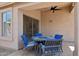 Covered patio with an outdoor table and chairs, perfect for entertaining at 17141 E Rockwood Dr, Fountain Hills, AZ 85268