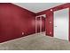 Cozy bedroom boasts plush carpeting and a mirrored closet for ample storage at 17244 N 29Th Ave, Phoenix, AZ 85053