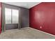 Inviting bedroom with soft carpeting and a large window for natural light at 17244 N 29Th Ave, Phoenix, AZ 85053