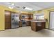 Spacious kitchen featuring granite countertops, stainless steel appliances, and tiled floors at 17244 N 29Th Ave, Phoenix, AZ 85053