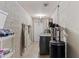 Functional laundry room with modern appliances and ample storage space for convenience at 17244 N 29Th Ave, Phoenix, AZ 85053