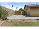 Extra parking in the rear through a locking gate, surrounded by charming landscaping at 17244 N 29Th Ave, Phoenix, AZ 85053