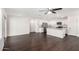 Bright modern kitchen and living area features hardwood floors and stainless appliances at 1762 E Elegante Dr, Casa Grande, AZ 85122