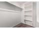 Well-organized walk-in closet with shelving and ample storage space for clothes and accessories at 1762 E Elegante Dr, Casa Grande, AZ 85122