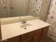 Bathroom vanity with white countertop and stainless steel faucet at 1827 E Carla Vista Dr, Gilbert, AZ 85295