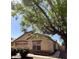Charming home featuring desert landscaping, a tile roof, and mature trees providing shade at 1827 E Carla Vista Dr, Gilbert, AZ 85295