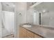 Bright bathroom featuring a vanity, mirror, and shower/tub combo at 1880 E Morten Ave # 125, Phoenix, AZ 85020
