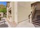 View of the exterior of the building with stairs leading up to the units at 1880 E Morten Ave # 125, Phoenix, AZ 85020