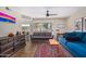 Inviting living room with two sofas, a unique coffee table, and lots of natural light at 1880 E Morten Ave # 125, Phoenix, AZ 85020