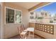 Private covered patio with seating area and outdoor views at 1880 E Morten Ave # 125, Phoenix, AZ 85020