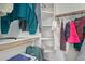 Spacious walk-in closet with built-in shelving and hanging rods to maximize organization at 1880 E Morten Ave # 125, Phoenix, AZ 85020