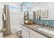 Bright bathroom with a granite countertop, white cabinets, and a shower-tub combination at 18812 E Bruno Dr, Gold Canyon, AZ 85118