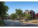 Community entrance with gate and attractive landscaping at 19360 N 73Rd St # 1070, Scottsdale, AZ 85255