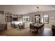 Bright living room and dining area with hardwood floors and built-in shelving at 19360 N 73Rd St # 1070, Scottsdale, AZ 85255